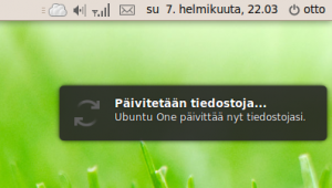 Ubuntu One paneelissa ja ilmoitus